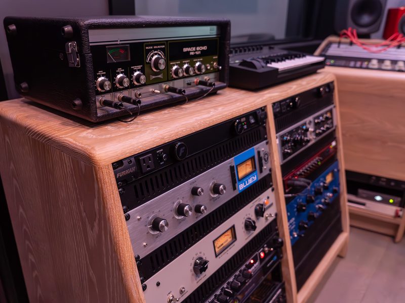 Outboard rack with a vintage tape echo unit on top
