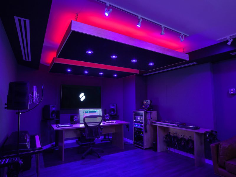 Production suite under coloured accent lighting